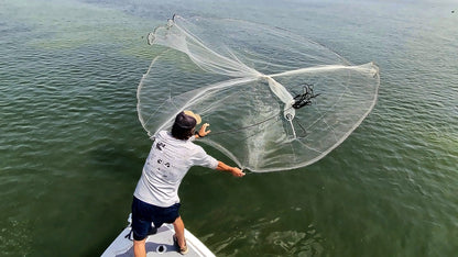 Overhead view of a Dropout cast net opening into a full circle